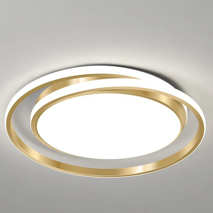 Diseño vanguardista de lámpara de techo LED en anillo, ilumina tu hogar con estilo moderno y eficiente.