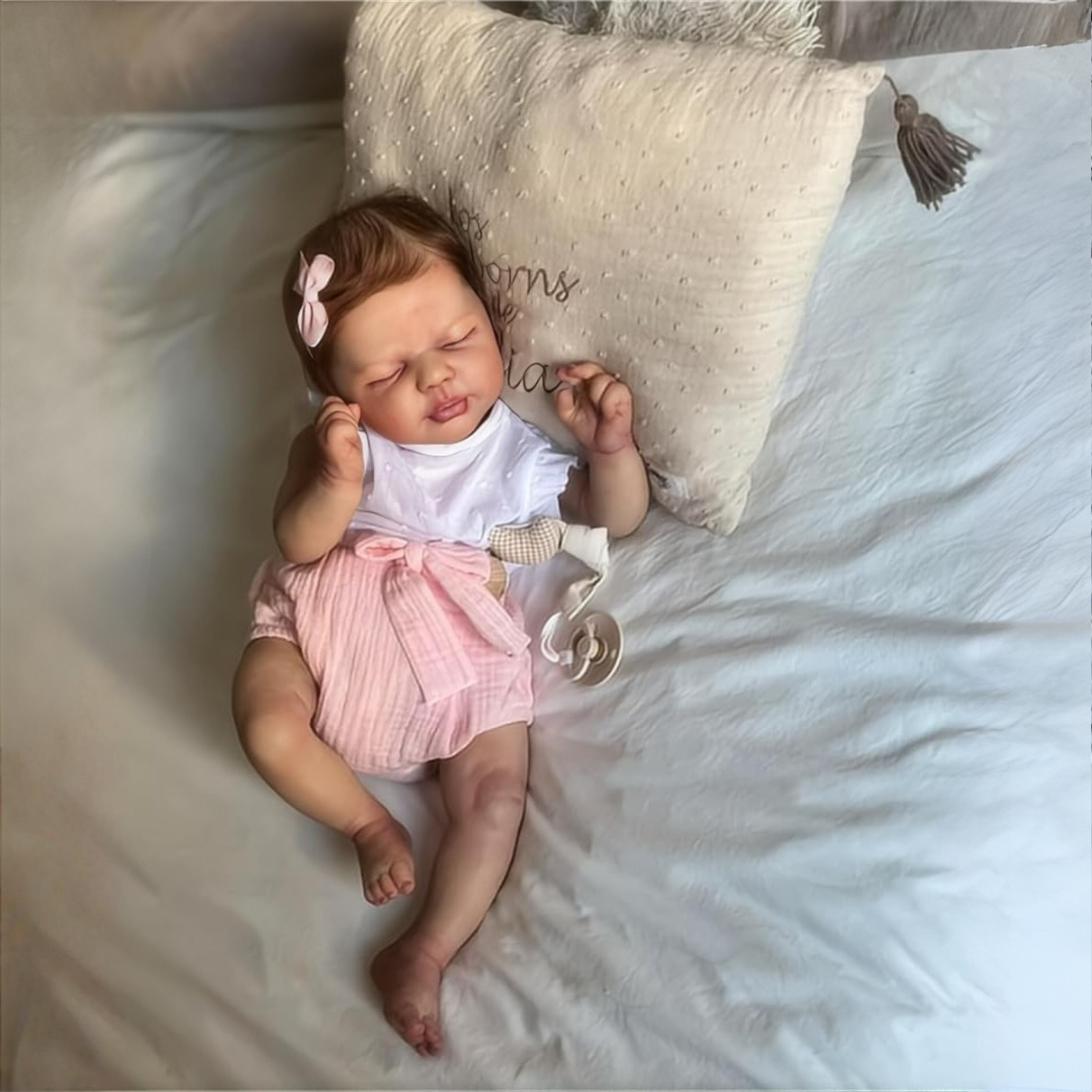 Muñeca bebé realista reborn de silicona suave, el regalo ideal para niñas amantes de los juguetes.