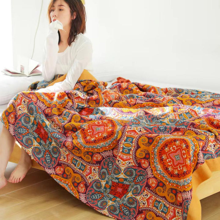 Manta de algodón reversible estilo boho. Fresca y ligera, ideal para un descanso confortable y decoración del hogar en verano.