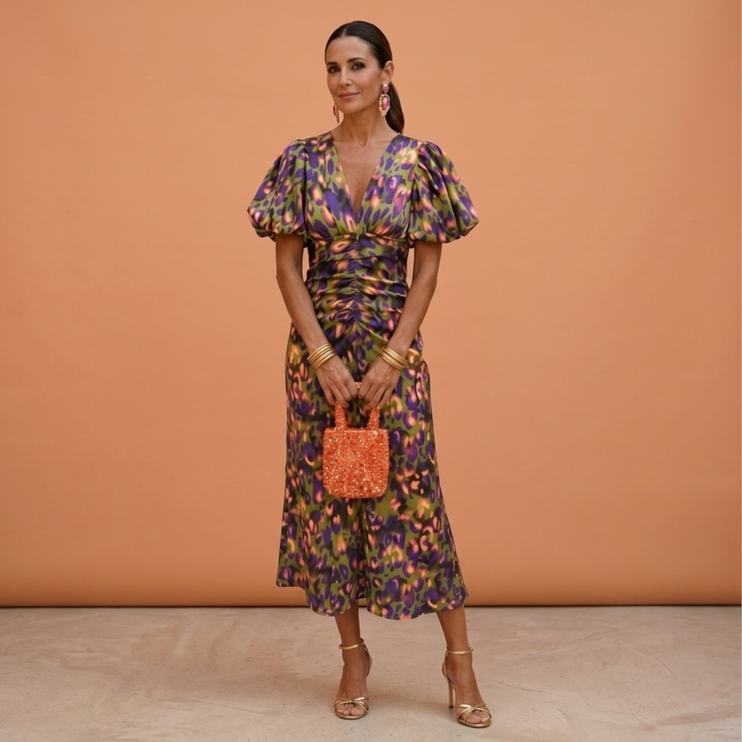 Ropa de mujer: vestido de primavera con escote V y mangas abullonadas, estilo elegante y moderno.