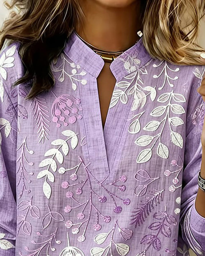 Elegante blusa de mujer con escote V y manga corta. Diseño floral para primavera/verano, corte regular y ajuste perfecto.