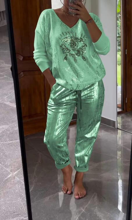 Conjunto mujer elegante brillante con escote V. Ideal para fiestas, ocasiones especiales y un estilo chic impecable.
