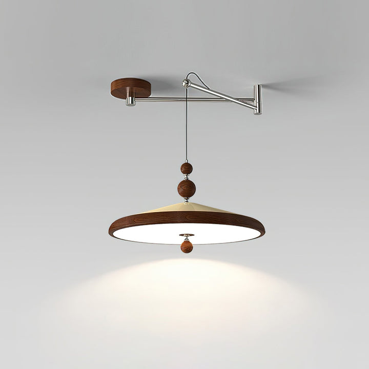 Lámpara colgante LED moderna con brazo oscilante negro y detalles de nogal. Iluminación ajustable.