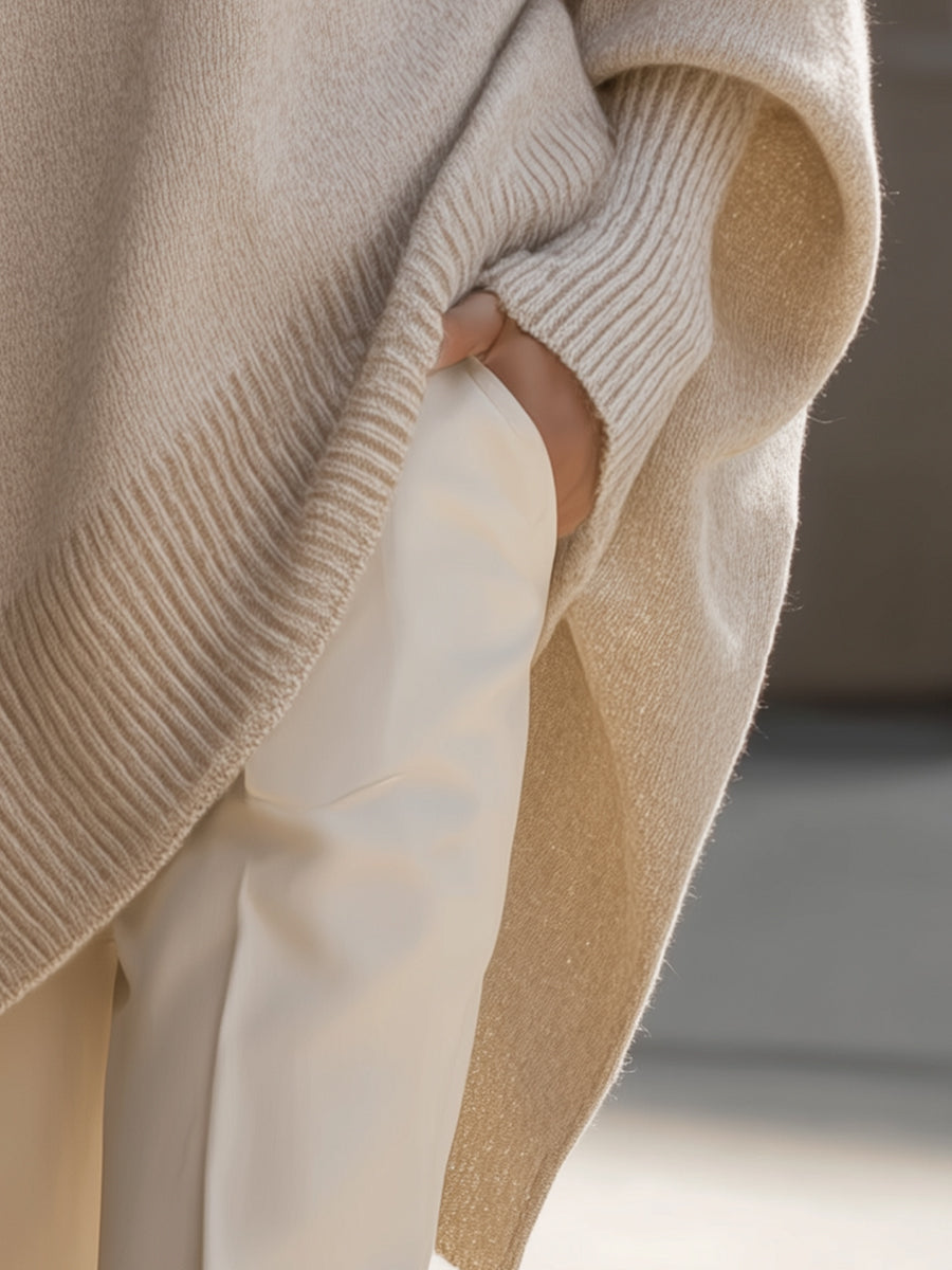 Poncho jersey de algodón oversize para mujer, con caída elegante. Ideal para combinar confort y moda en invierno.