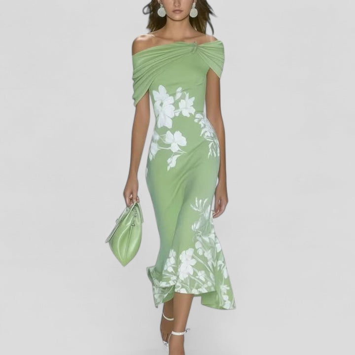 Vestido midi estampado floral elegante para mujer. Ideal para verano y ocasiones especiales, combina moda y comodidad.