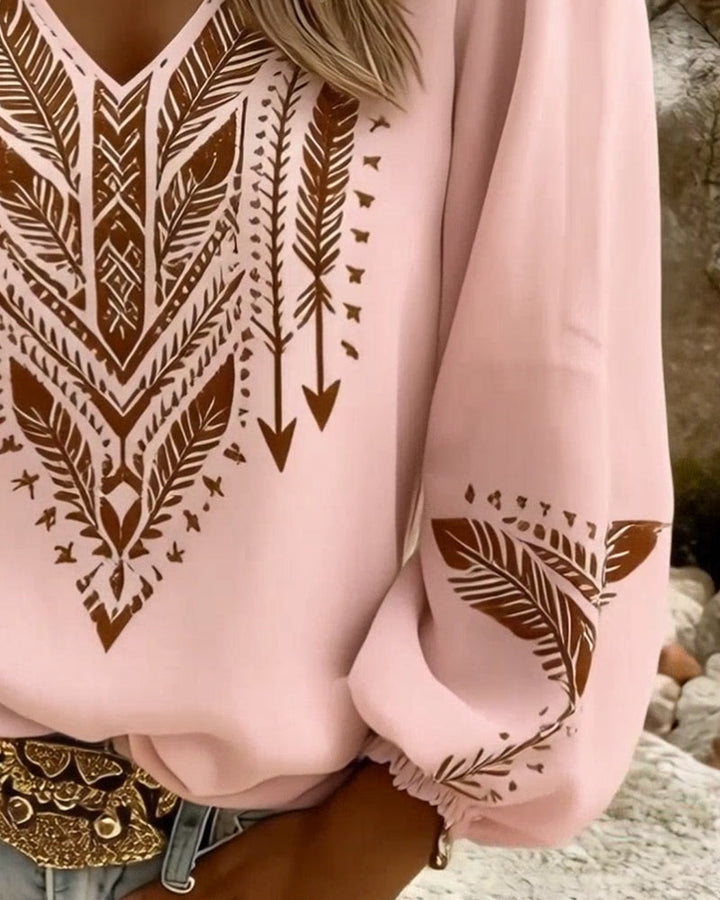 Blusa mujer casual con estampado étnico detallado, escote en V y manga abullonada. Ideal para día.