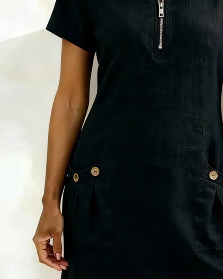 Vestido casual para mujer, diseño corto, con cremallera frontal en el cuello y bolsillos.
