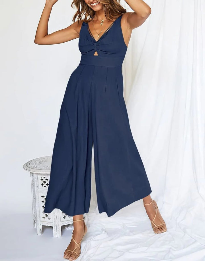 Mono jumpsuit de invitada, escote V, pernera ancha. Alternativa chic al vestido para eventos.