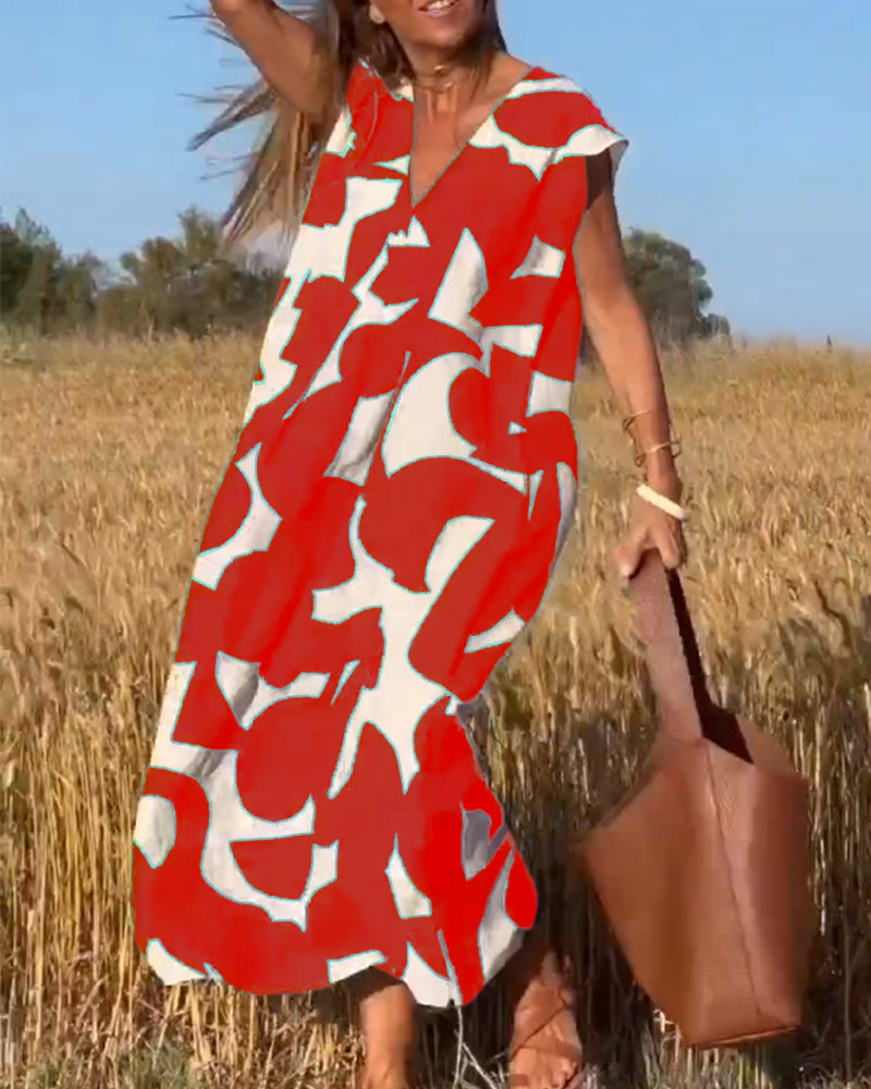 Vestido fluido y cómodo para mujer, estampado moderno, escote V. Ideal para primavera-verano.