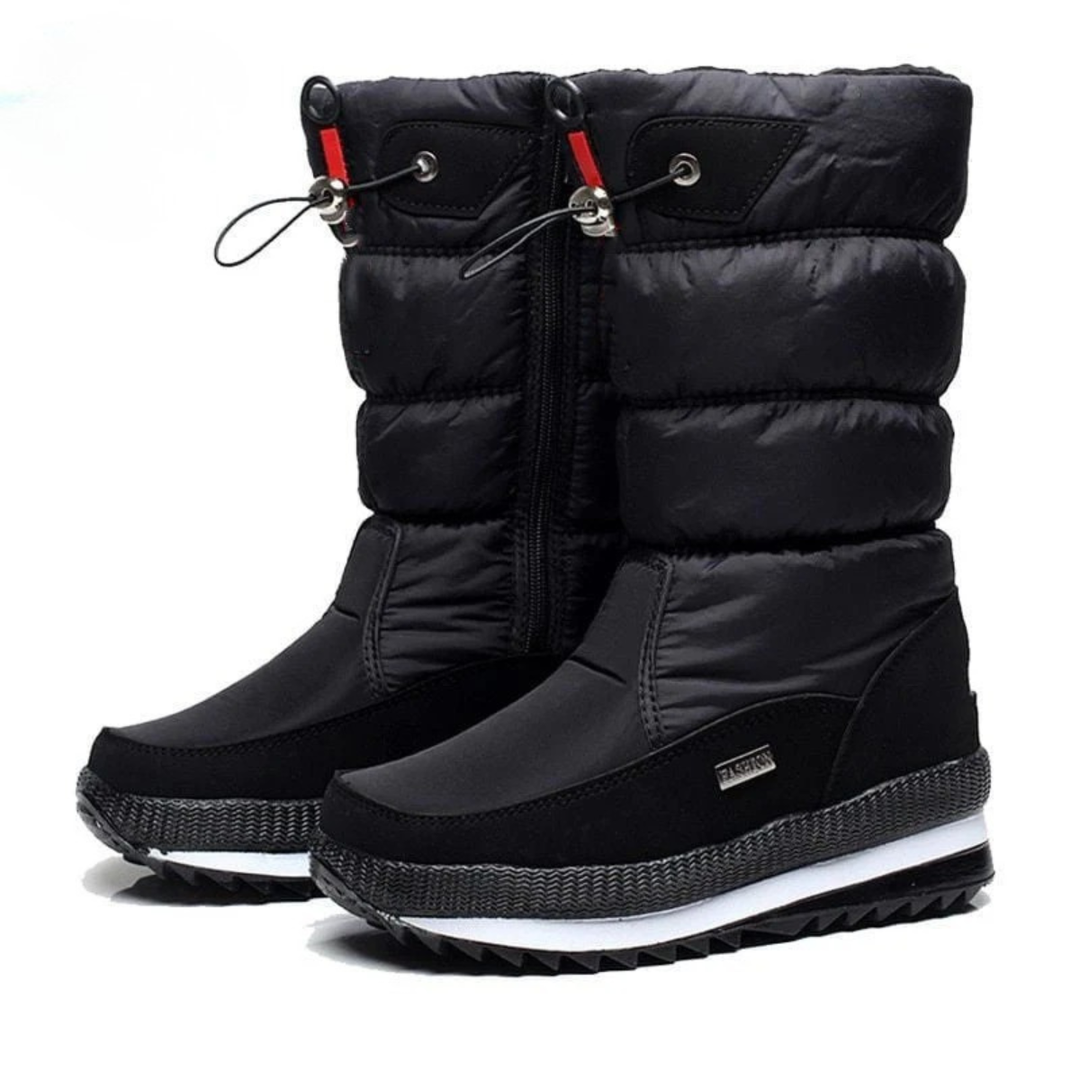 Suela antideslizante de botas de nieve mujer, estilo Gresia, para seguridad y tracción en superficies heladas.