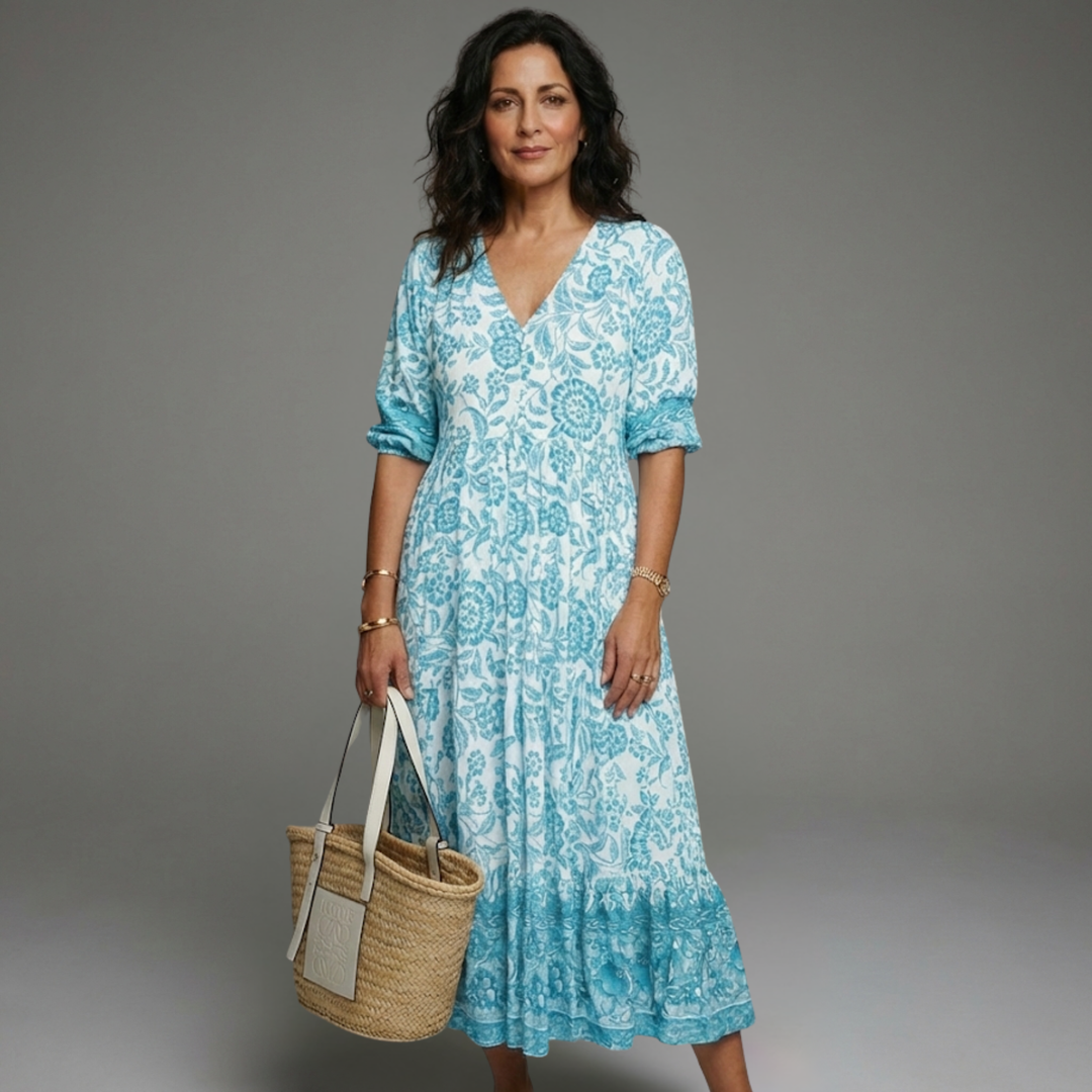 Vestido floral de mujer, escote V, diseño fluido y colores de verano. Cómodo y elegante para cualquier ocasión.