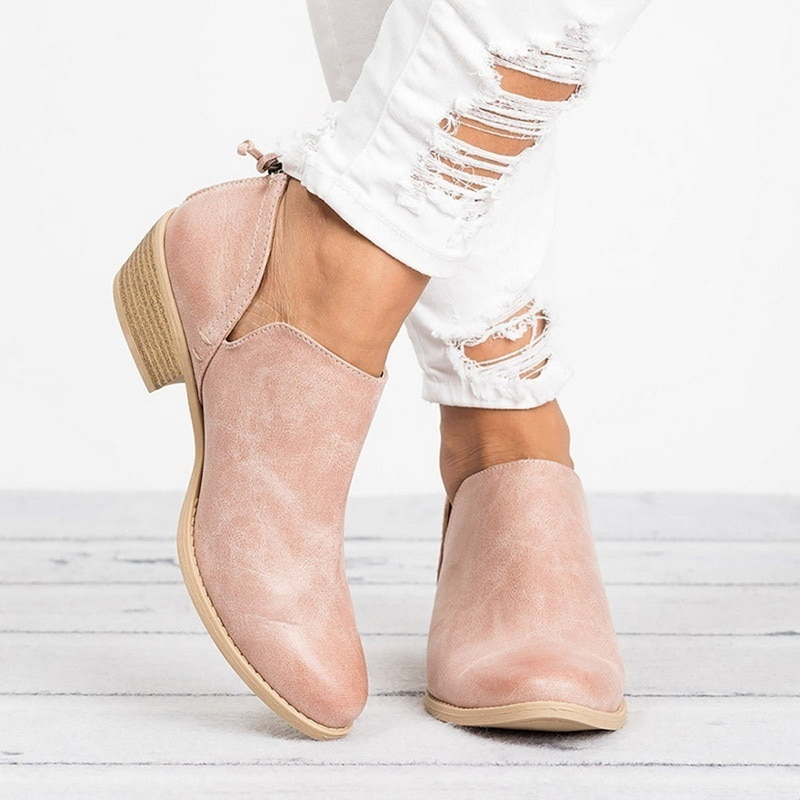 Botines de mujer con tacón bajo para comodidad diaria, perfectos para un estilo versátil y elegante.