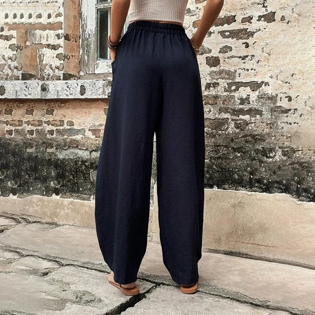 Pantalones fluidos de mujer, pierna ancha, versátiles para estilo casual o elegante de primavera-verano.