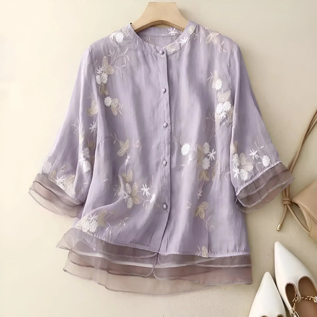 Blusa floral de algodón Giovanna para mujer. Prenda versátil que combina elegancia con un estilo primaveral.