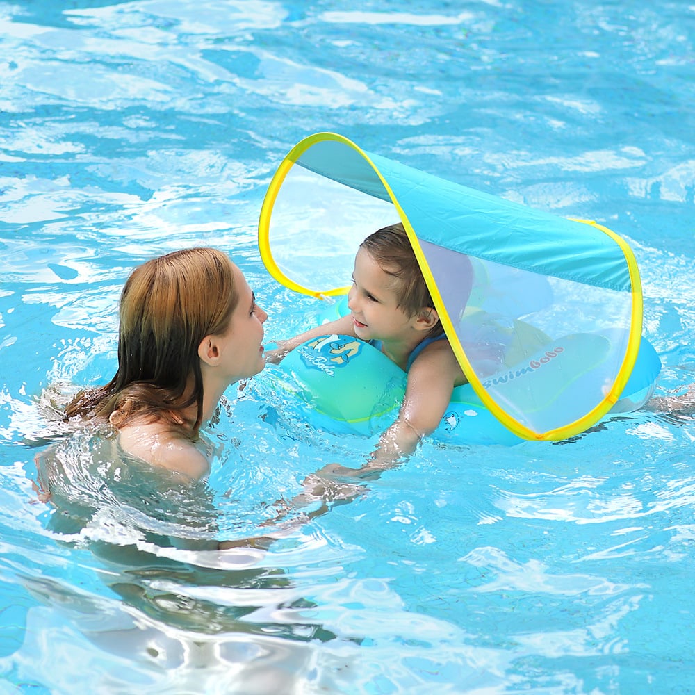 Verano seguro: flotador infantil con toldo UV para piscina, ideal para bebés y niños pequeños en el agua.