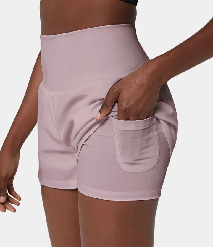 Short de entrenamiento con bolsillos, cintura alta, para mujer activa en el gym.