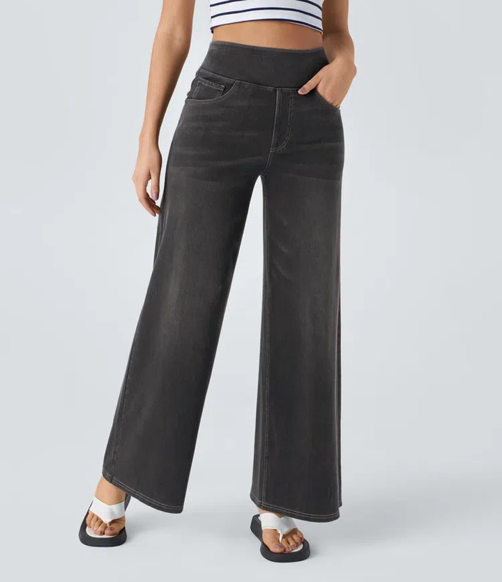 Pantalón jean de mujer talle alto elástico, silueta moldeadora, pierna ancha para moda femenina.
