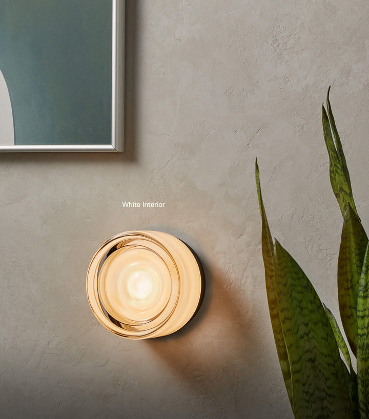 Aplique LED IP65 para pared exterior, iluminación ambiental moderna con efecto ondulado.