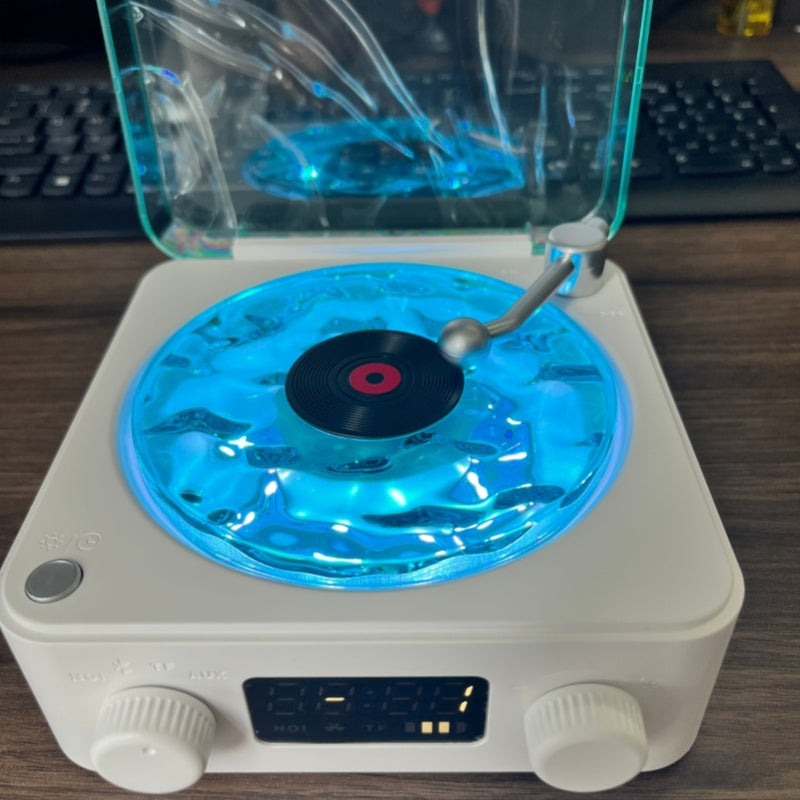 Altavoz Bluetooth retro unisex con proyector de olas y sonidos relajantes. Portátil para el hogar.