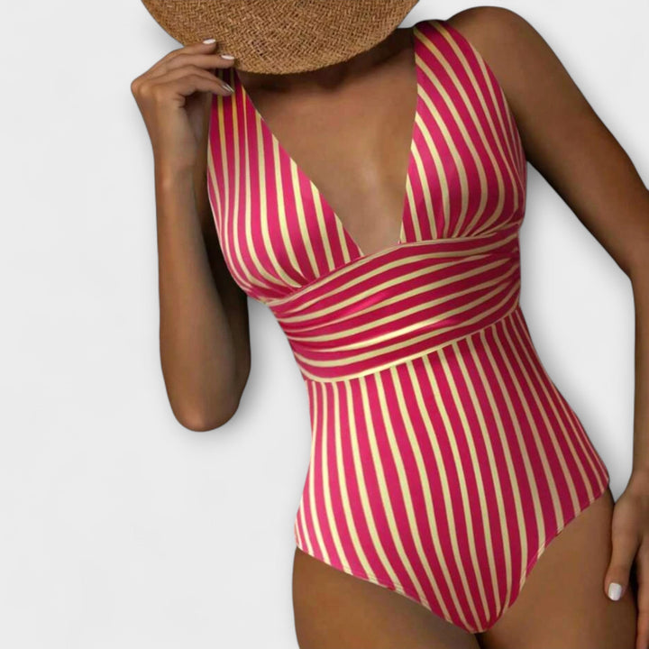 Traje de baño cómodo de mujer con diseño de rayas y escote en V. Perfecto para playa y piscina en verano.