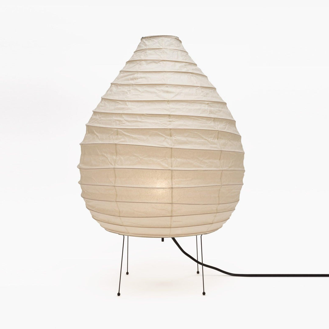 Lámpara Japandi de líneas limpias, diseño minimalista perfecto para iluminación de suelo o mesa moderna.