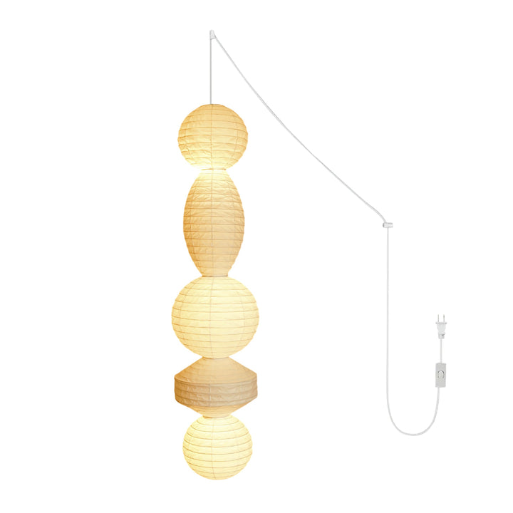 Lámpara colgante Akari Tayo, pantalla geométrica inspirada en diseño japonés, luz ambiental difusa.