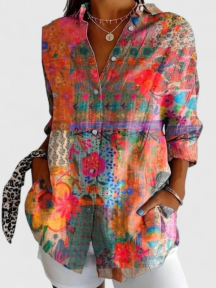 Camisa floral Alba para mujer, estampado vibrante de primavera. Manga larga, estilo casual elegante.