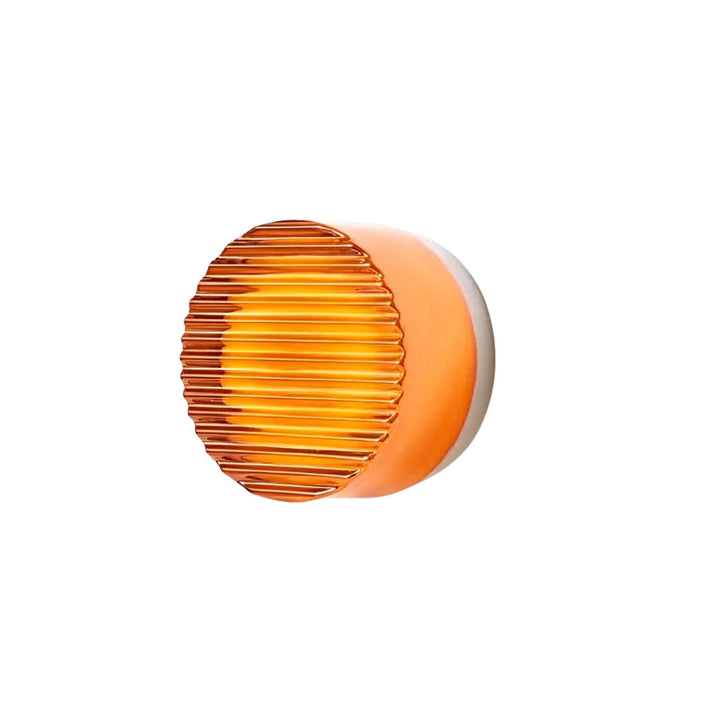 Lámpara de pared LED redonda para dormitorio. Crea un ambiente cálido con su luz suave y diseño moderno.