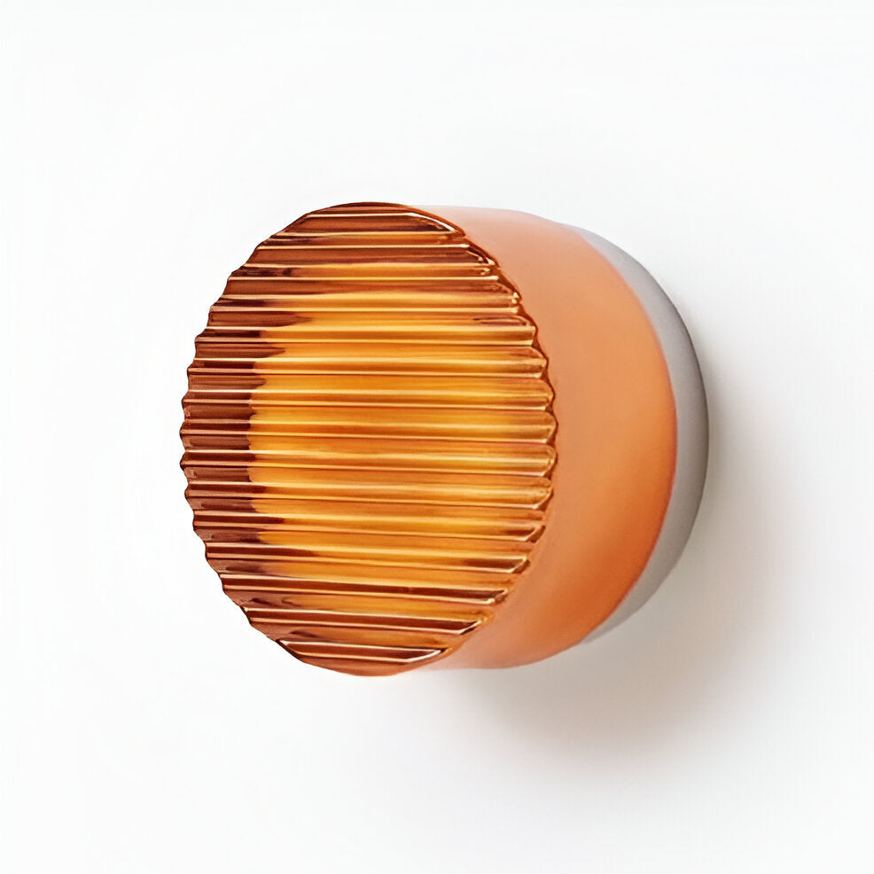 Aplique de pared LED redondo con luz suave. Crea un ambiente acogedor y un estilo moderno en el dormitorio.