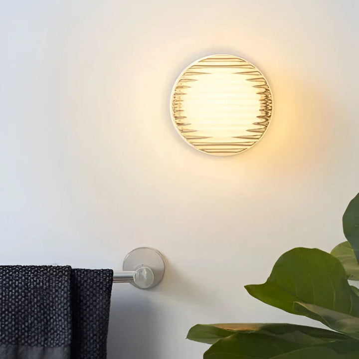 Iluminación interior LED con aplique de pared redondo. Un diseño moderno que embellece cada espacio.