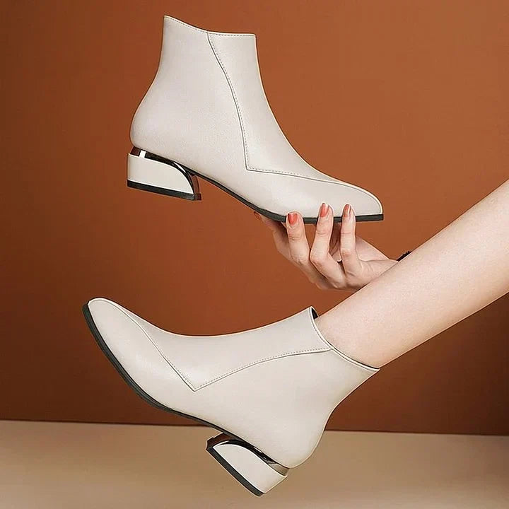 Moda otoño: Botines puntiagudos de mujer con tacón bajo y cremallera, calzado elegante y versátil.
