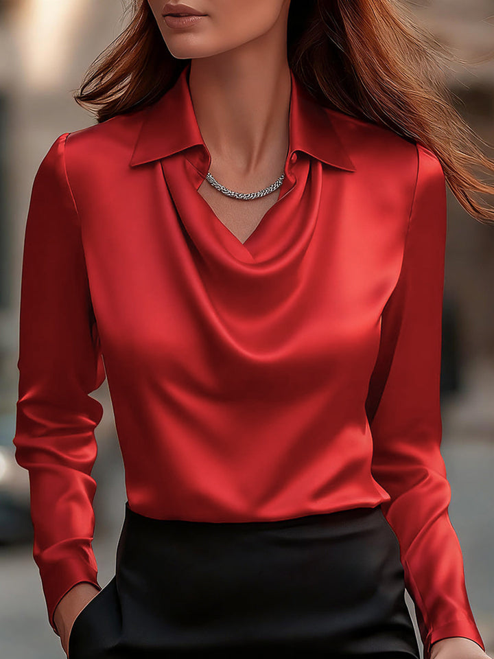 Blusa de mujer con cuello cowl y manga larga, perfecta para ocasiones especiales y fiestas elegantes.