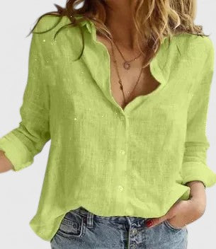 Blusa de mujer manga larga con escote en V y botones de nácar. Prenda casual elegante para moda femenina.