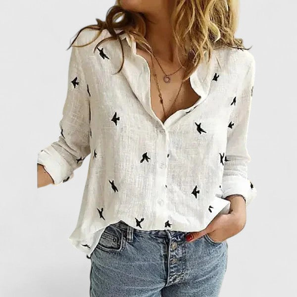 Camisa de mujer elegante y casual, manga larga, cuello V. Con botones de nácar para un toque sofisticado.