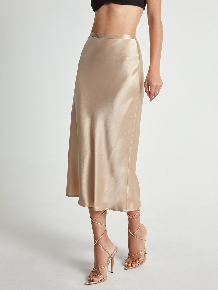 Falda midi de satén elegante para mujer, ideal para eventos formales o fiestas. Comodidad sofisticada.
