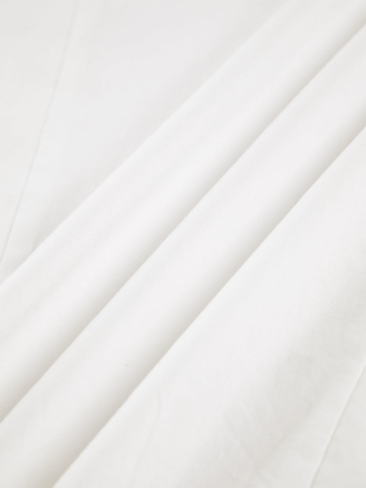 Camisa de botones para mujer, diseño clásico atemporal, manga larga, perfecta para estilo elegante y cómodo.
