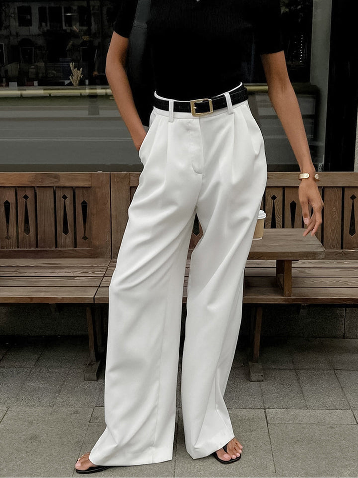 Elegante pantalón de mujer talle alto, pierna ancha, ideal para oficina o eventos.