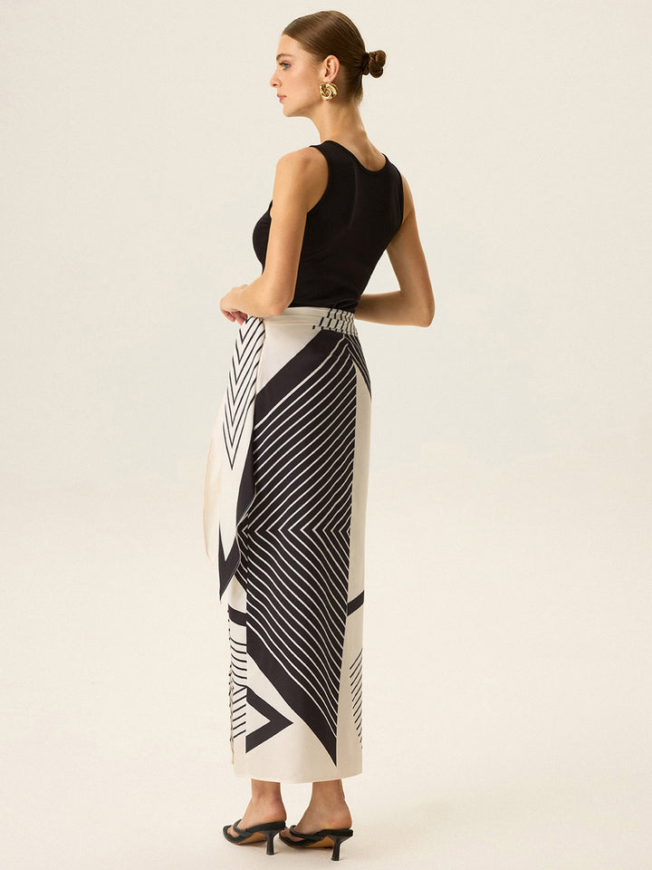 Conjunto de falda y top para mujer. Estilo sofisticado, estampado vibrante. Moda femenina para días soleados.