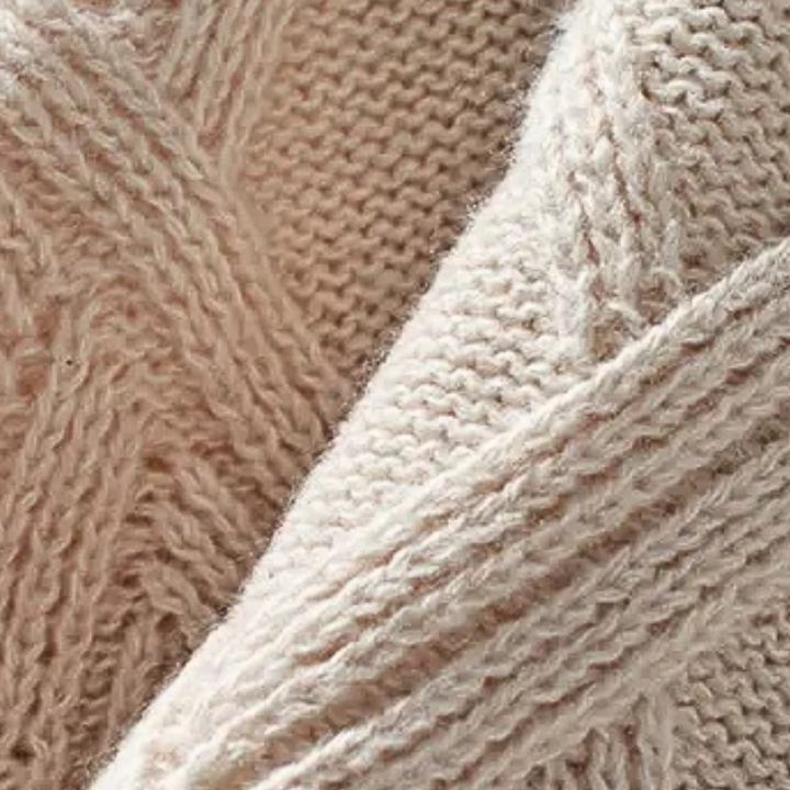 Suéter de punto trenzado para mujer, cómodo y sofisticado. Estilo clásico, perfecto para el frío invernal.
