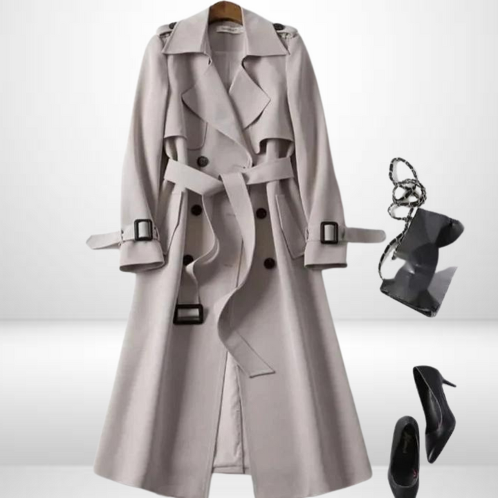Abrigo de invierno largo y elegante para mujer, corte moderno que estiliza. Moda abrigadora.