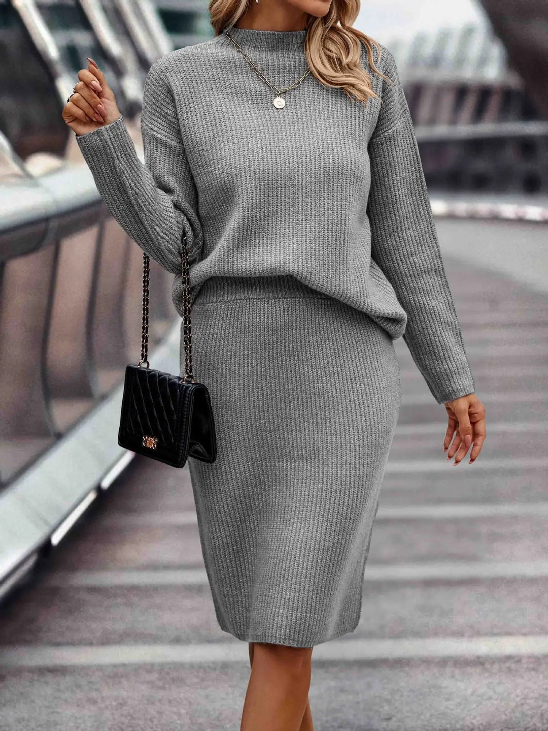 Conjunto acanalado de punto midi para mujer, top de manga larga y falda. Estilo chic casual y confortable.