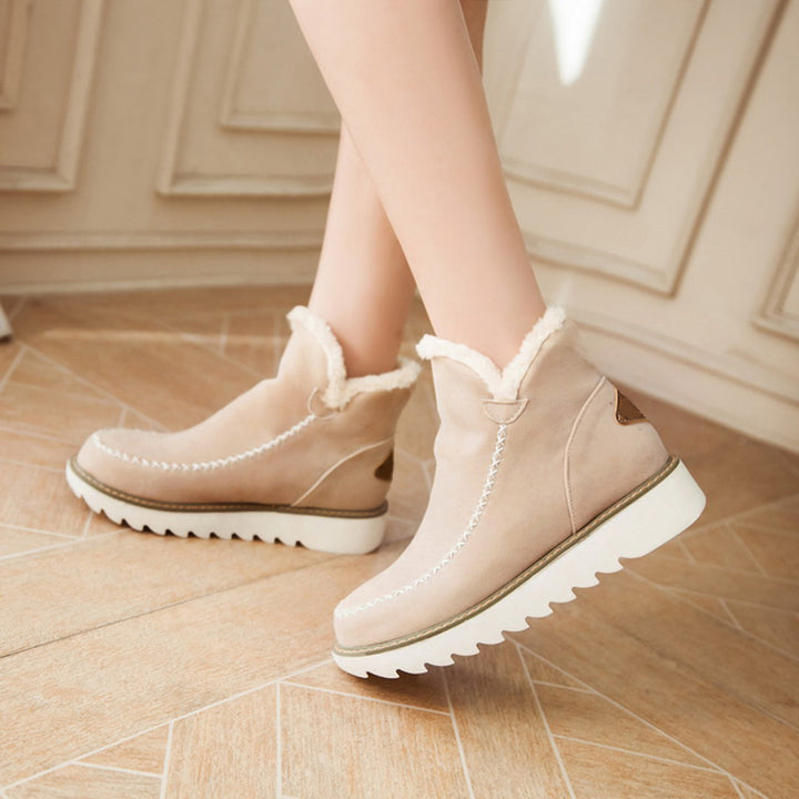Botas de invierno para mujer en tono marrón. Cálidas, antideslizantes, con estilo y perfectas para el invierno.