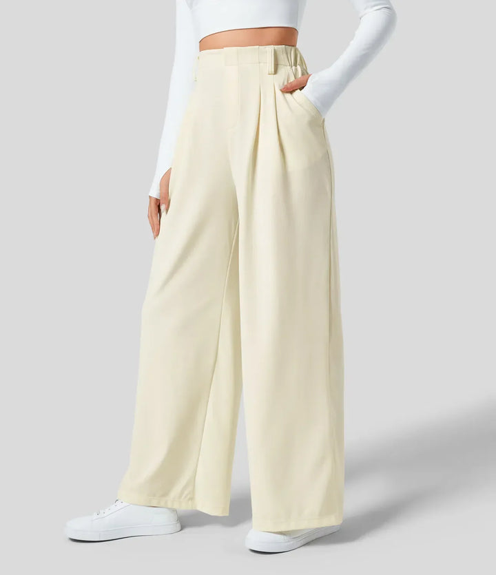 Pantalón chic de talle alto y pernera ancha, moda femenina para un look estilizado.