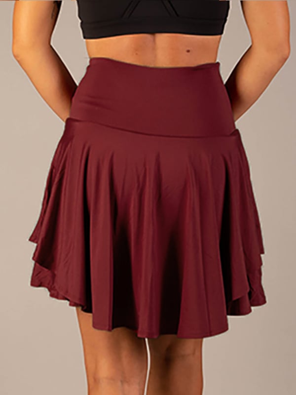 Minifalda femenina con capas, cintura alta y corte acampanado, ropa de verano trendy.