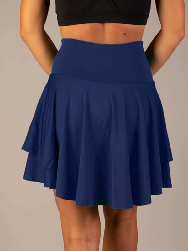 Minifalda de moda para mujer, estilo acampanado con cintura alta y capas decorativas.