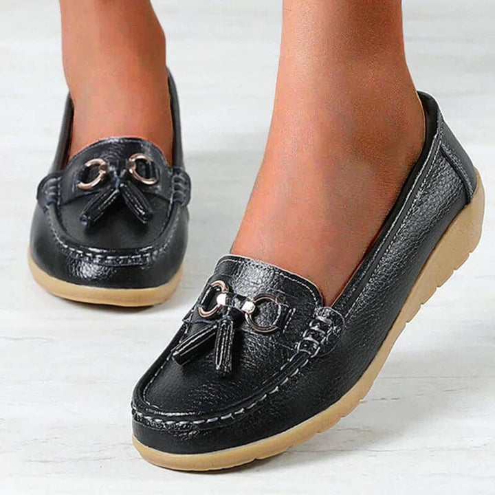 Suela antideslizante de zapatillas planas ortopédicas de mujer, seguridad y estabilidad.