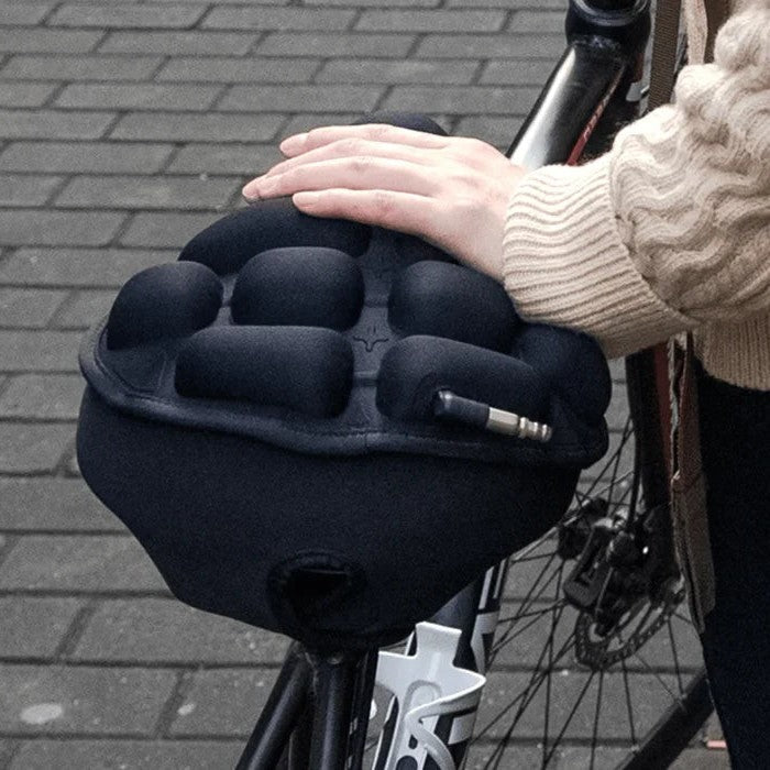 Cojín de asiento para bicicleta unisex, diseño ergonómico y descompresor para confort óptimo al pedalear.