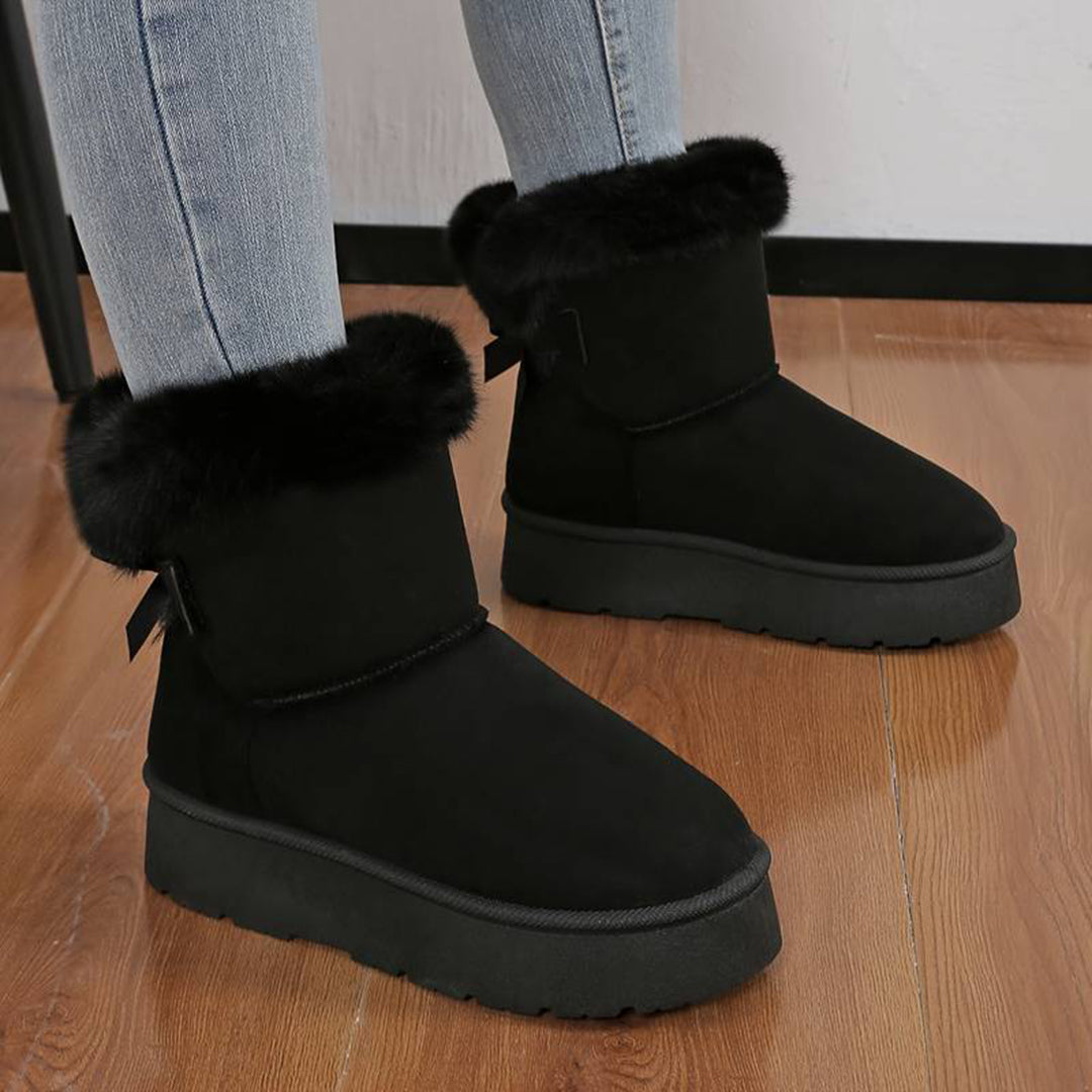 Botas de invierno altas para mujer con suela antideslizante, ideales para el frío y la nieve.