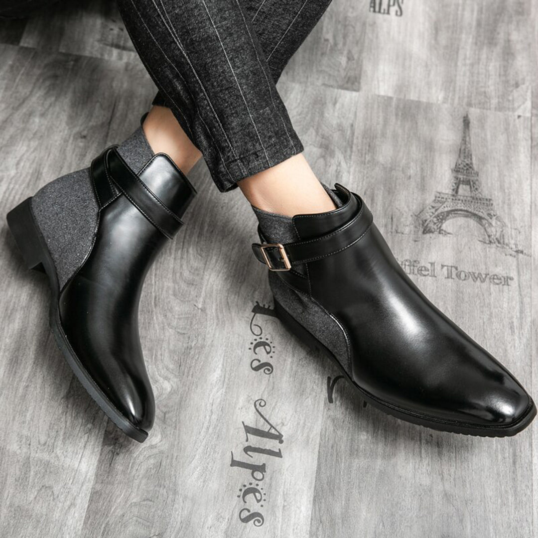 Botines negros elegantes para hombre, ideales para look formal o casual.