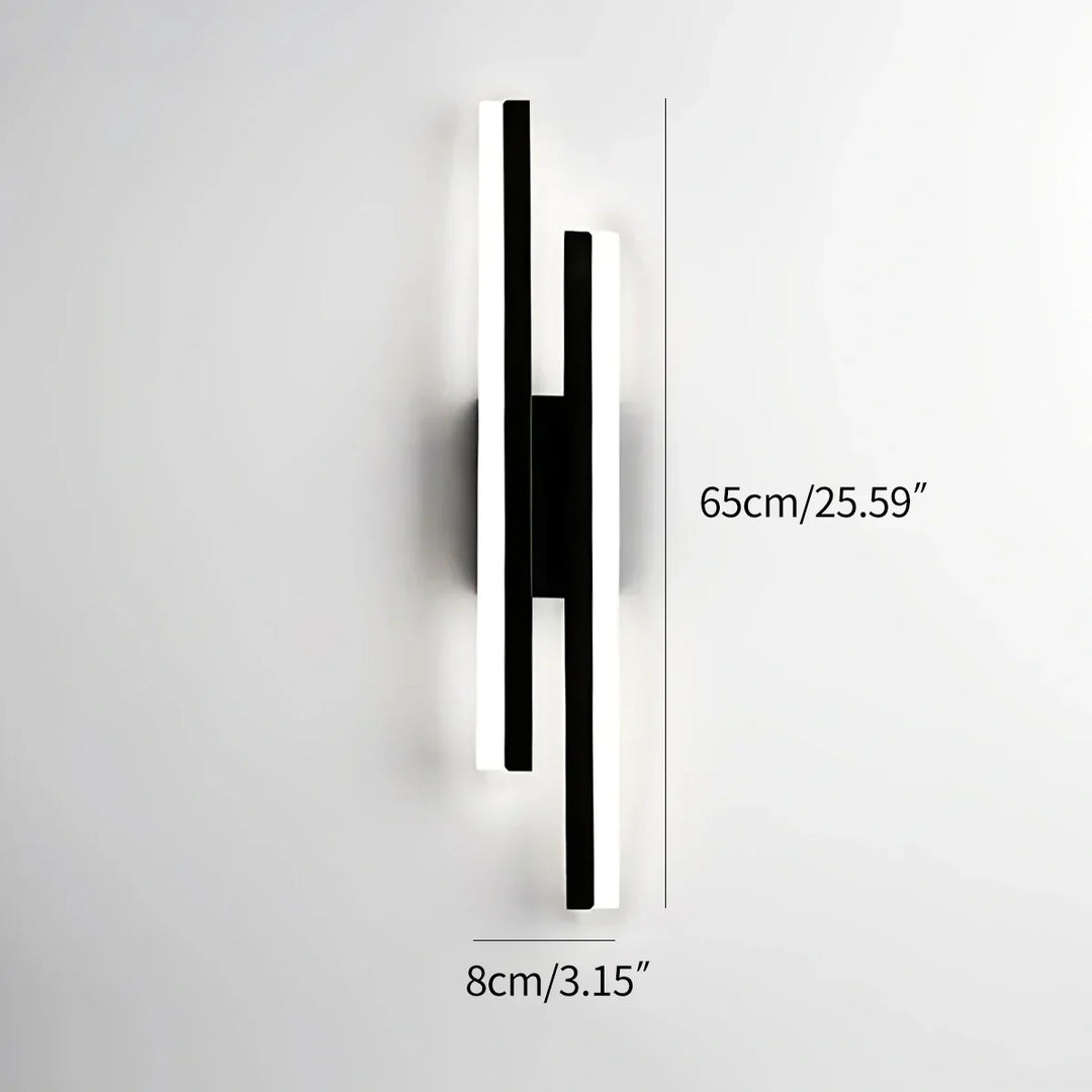 Moderno aplique de pared LED en H, acabado liso. Fácil de integrar en cualquier decoración del hogar.